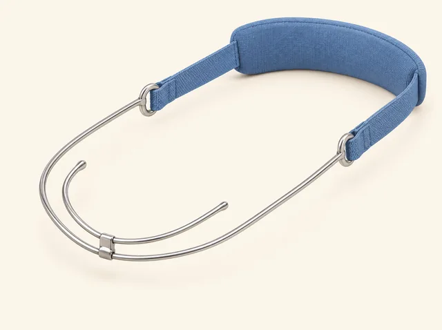AI educational rendering of a headgear appliance alone, with two nested metal bows and a blue padded strap; no teeth or person.