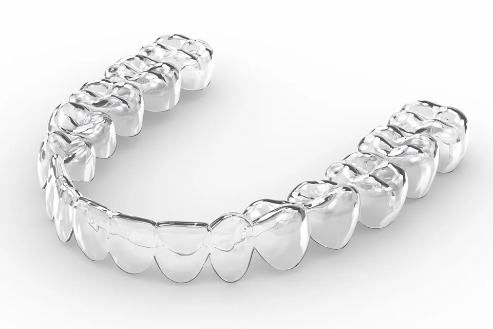 Render of a transparent aligner tray seen from above